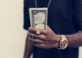 African holding cash