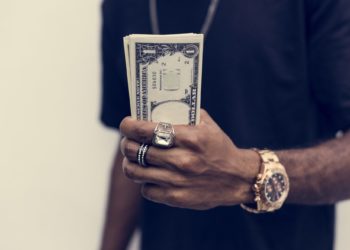 African holding cash