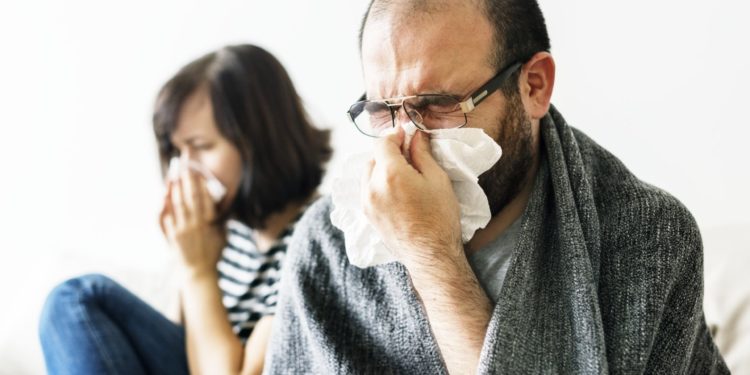 Couple sick together at home