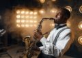 Black jazz performer plays the saxophone on stage